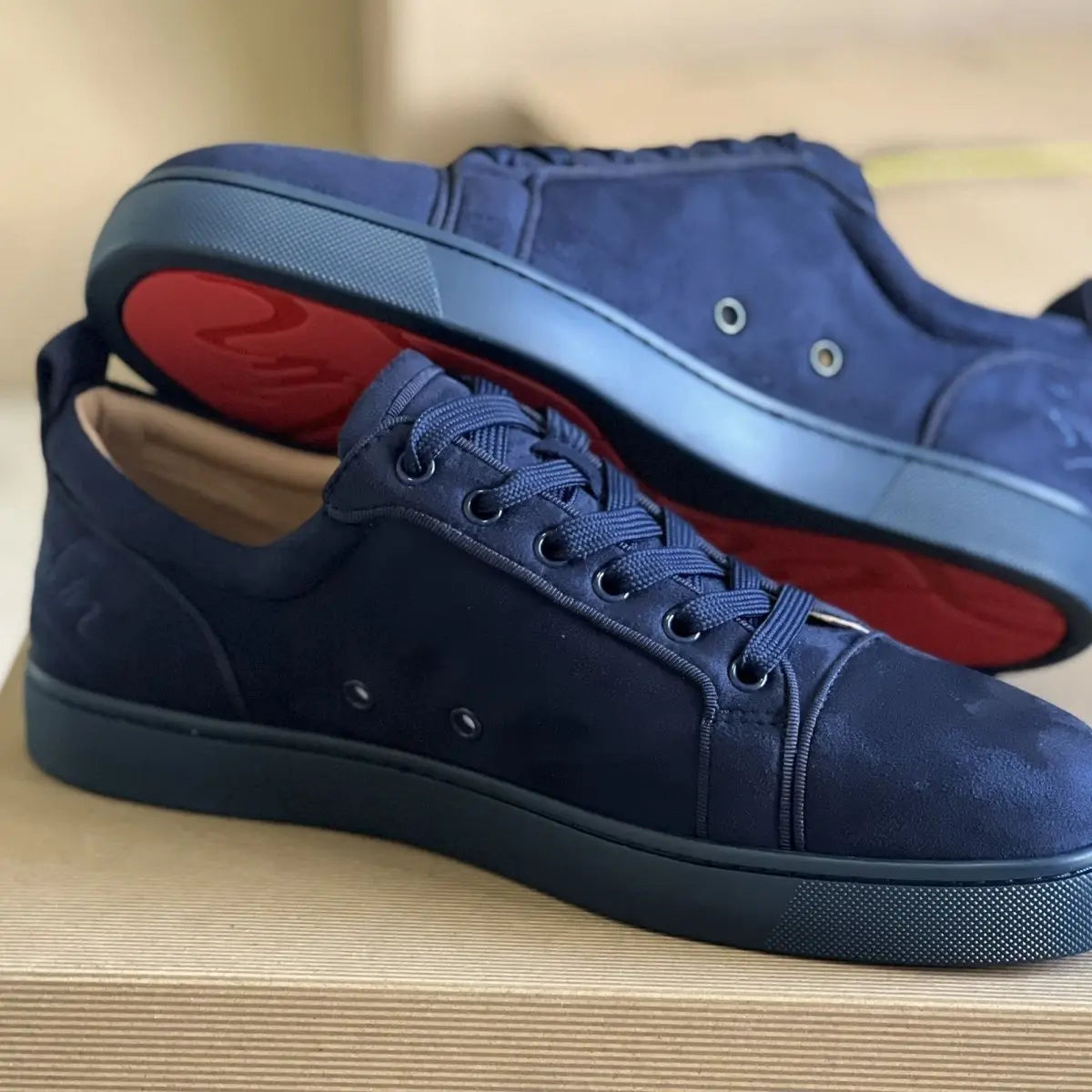 men´s red sole shoes