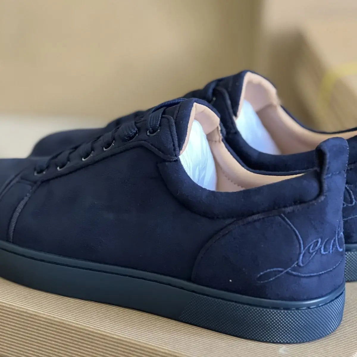 men´s red sole shoes